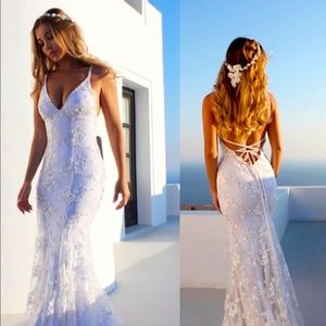 Women’s white wedding dress. Never worn.